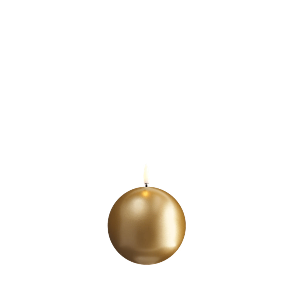 Gold candle on a white background