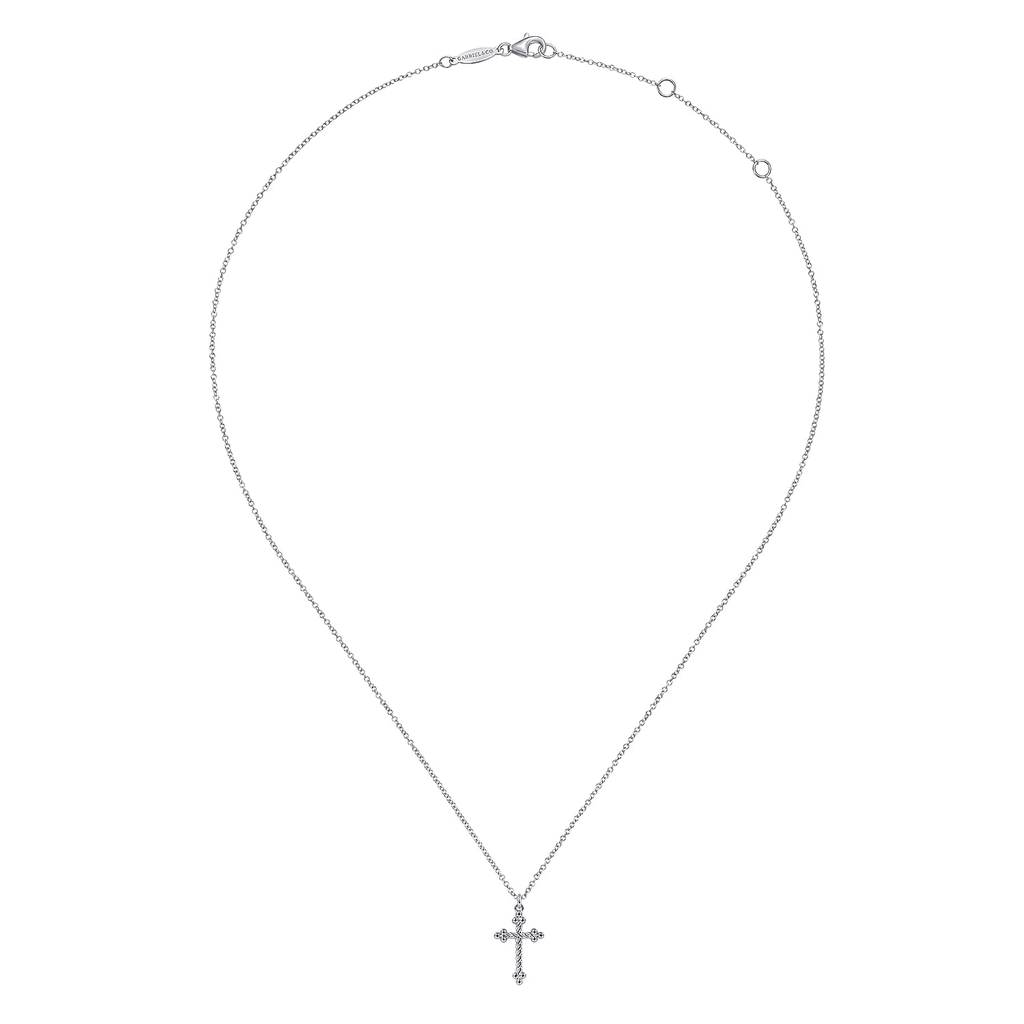 silver twist cross pendant necklace on white background