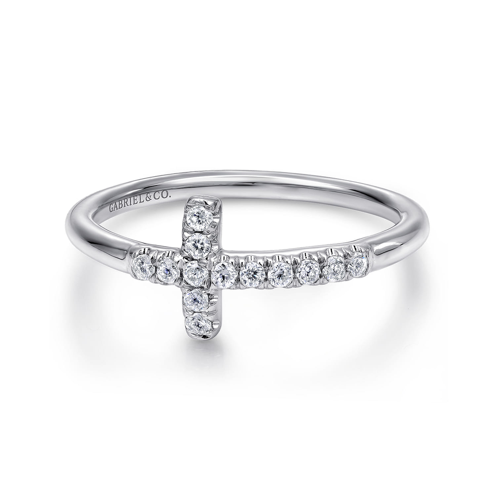 Silver ring with a cross design and small diamonds on a white background