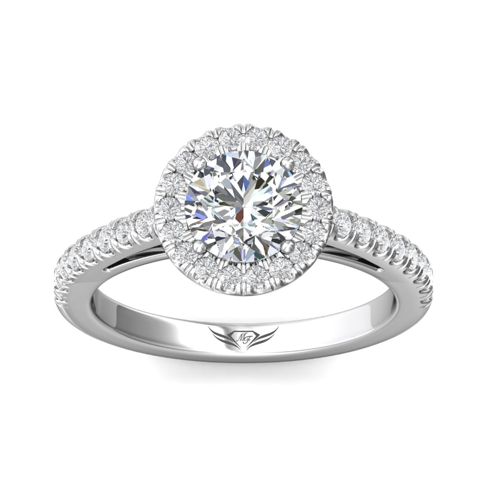 Diamond ring with a halo and smaller diamonds on a white background