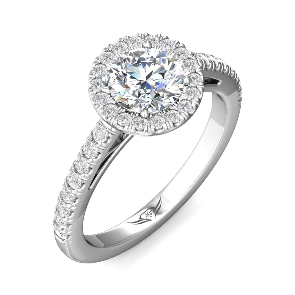 Diamond ring with a halo and pavé setting on a white background
