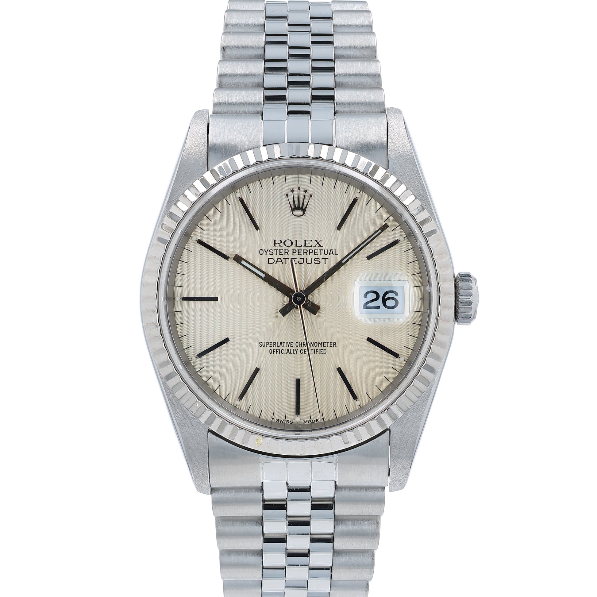 Rolex watch with a silver tapestry dial and a white gold fluted bezel on a white background