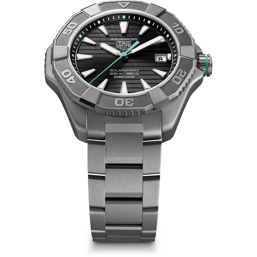 Silver watch with black dial on a white background