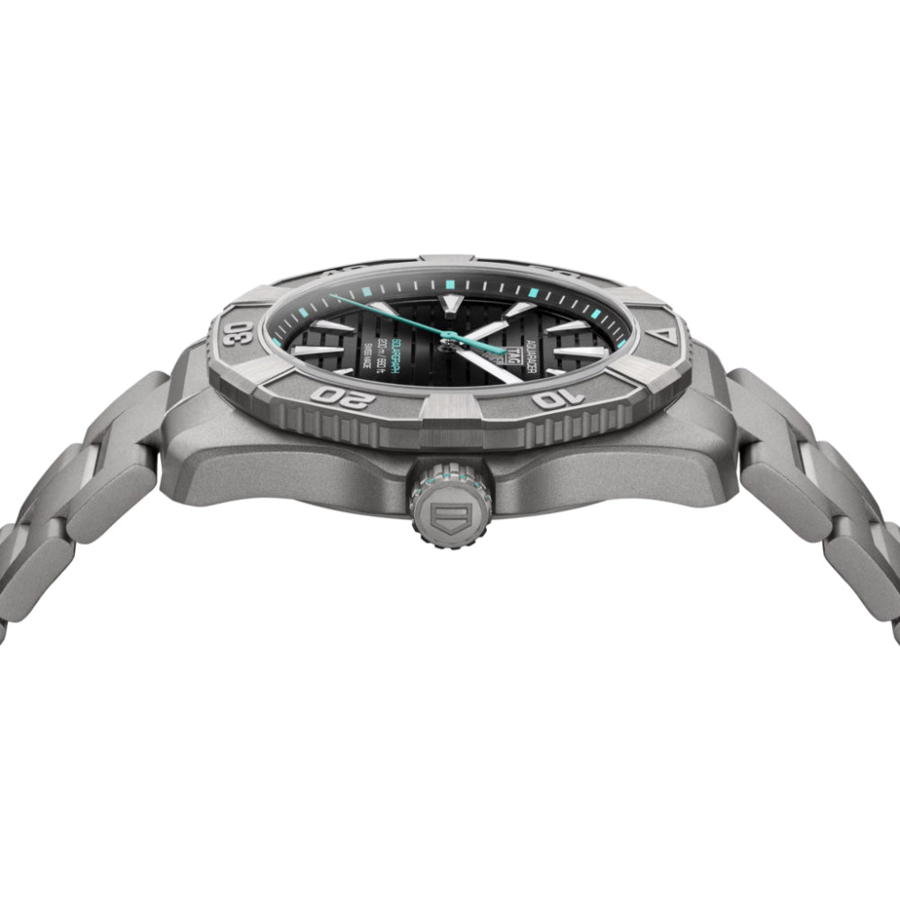 Silver watch with a detailed face on a white background
