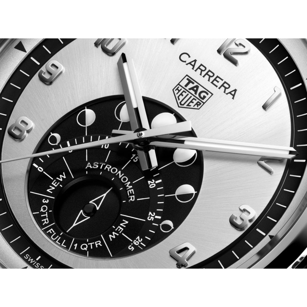 Close-up of a Tag Heuer Carrera watch face with detailed design.