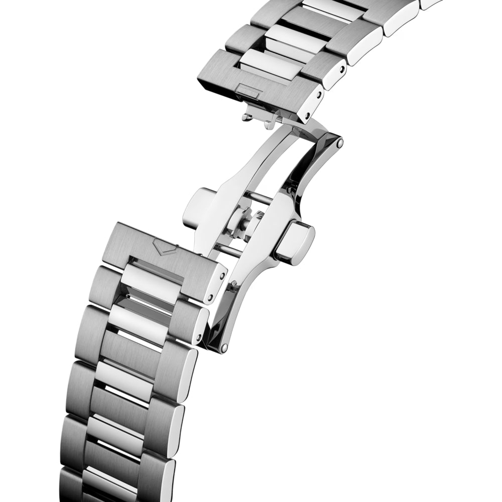 Steel TAG Heuer watch bracelet with a butterfly clasp on a white background