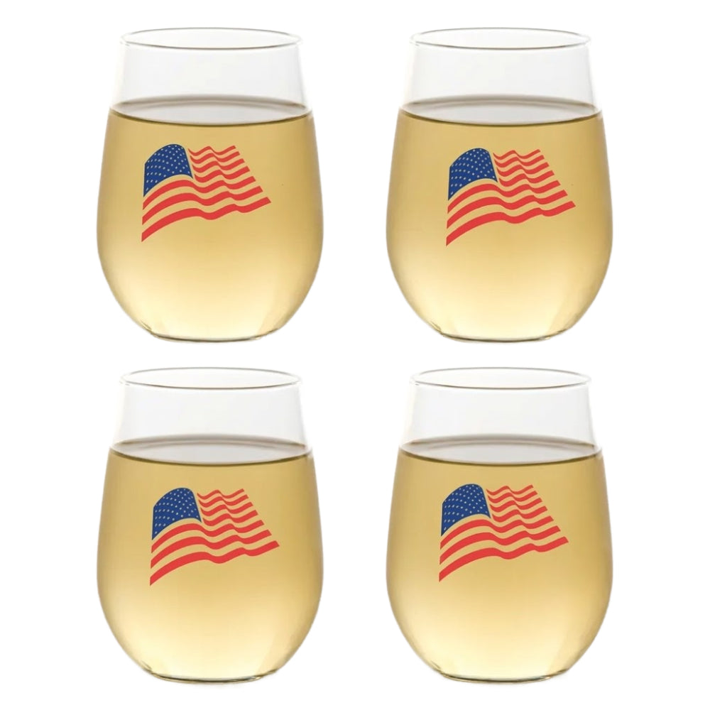 Four wine glasses with American flag design filled with a light yellow liquid on a white background.