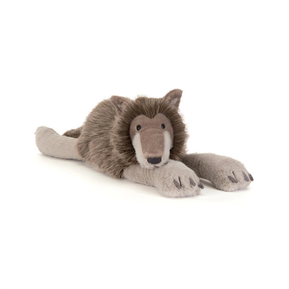 A plush stuffed animal shaped like a wolf, lying down on a clean white background. The toy has a brown and gray body with a lighter beige muzzle and gray paws.