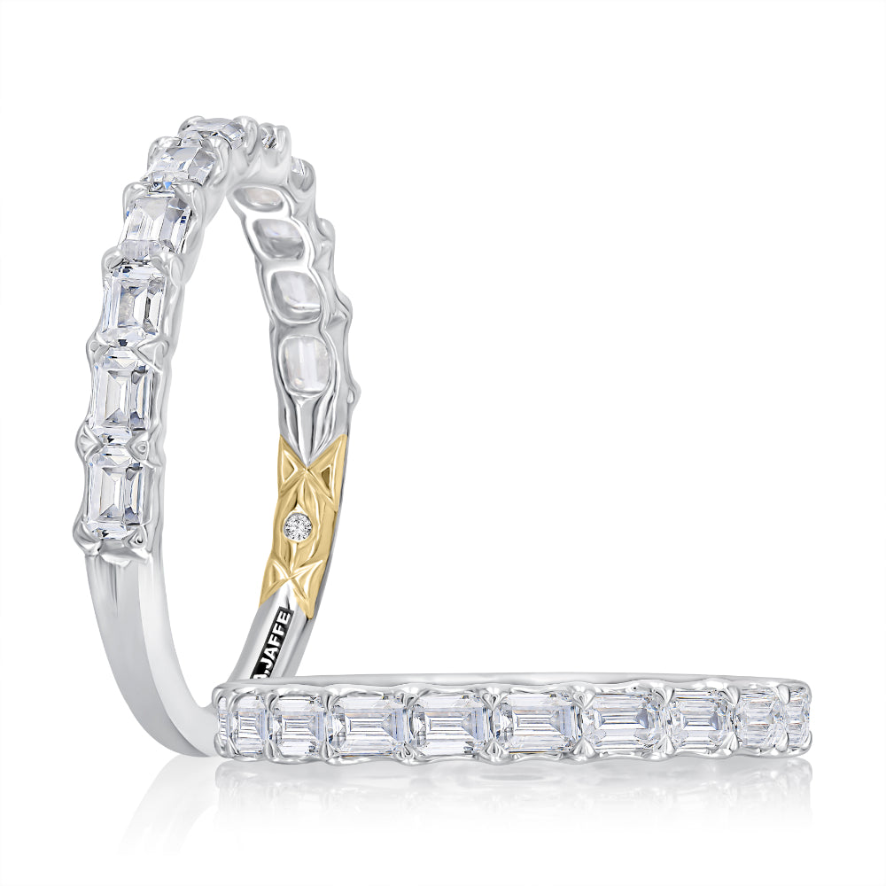 Diamond ring with a gold accent on a white background