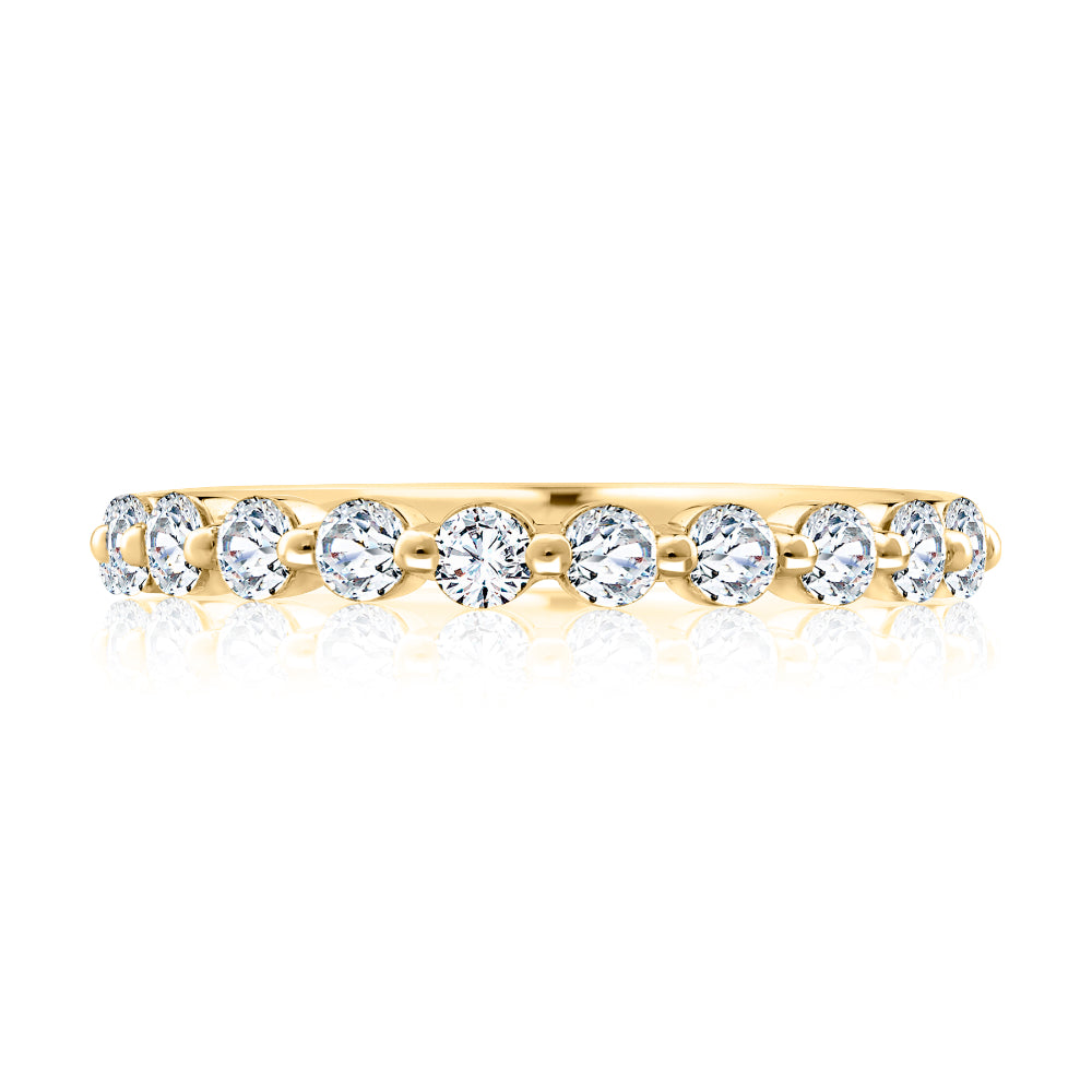 Gold ring with diamonds on a white background