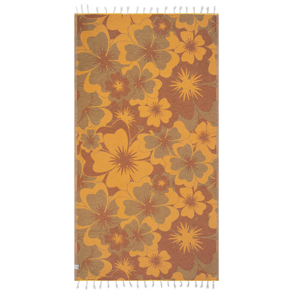 Side two of a floral patterned beach towel with orange and brown colors and a white tassel edge on a white background.