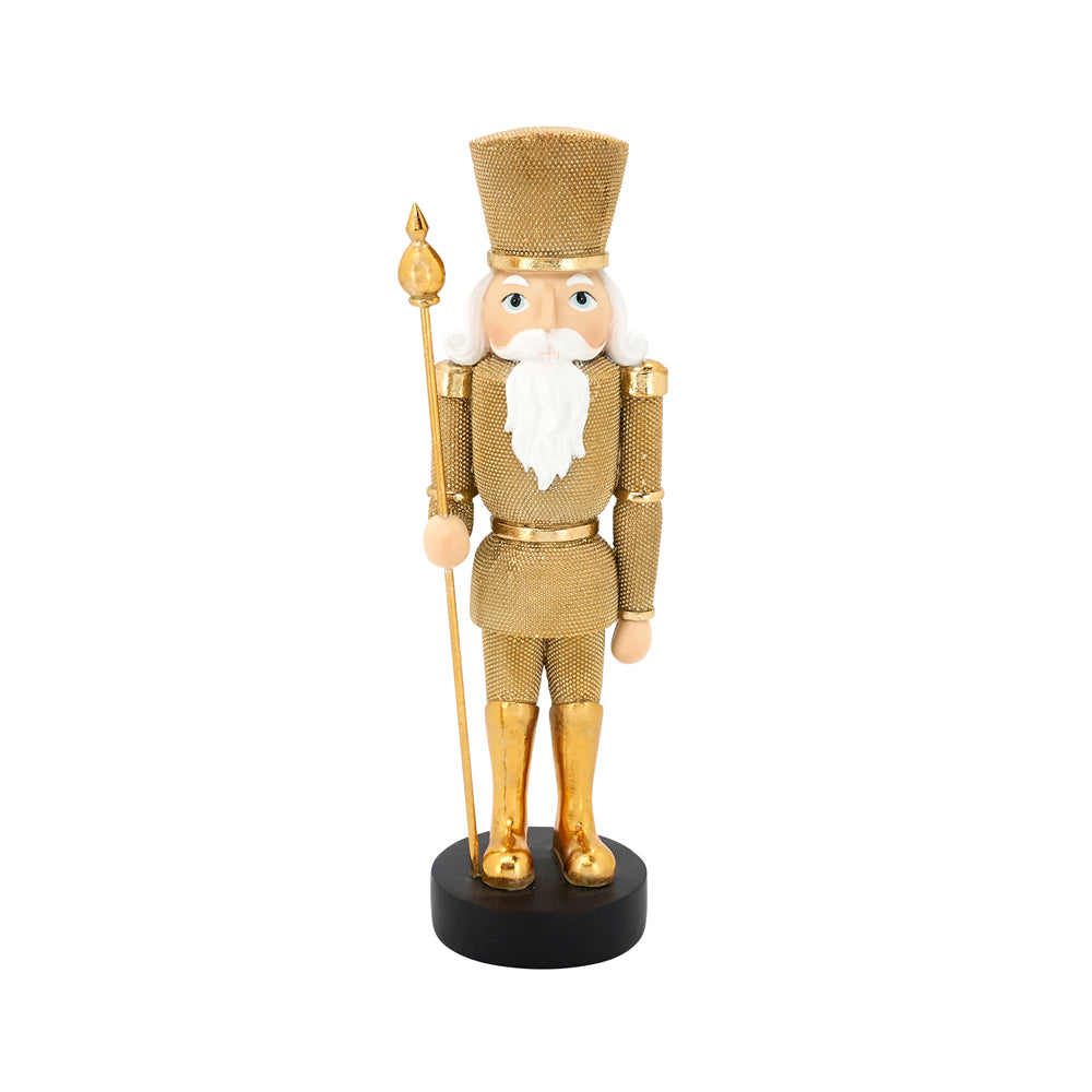 A gold glitter nutcracker soldier figurine holding a spear, standing on a black circular base against a white background.