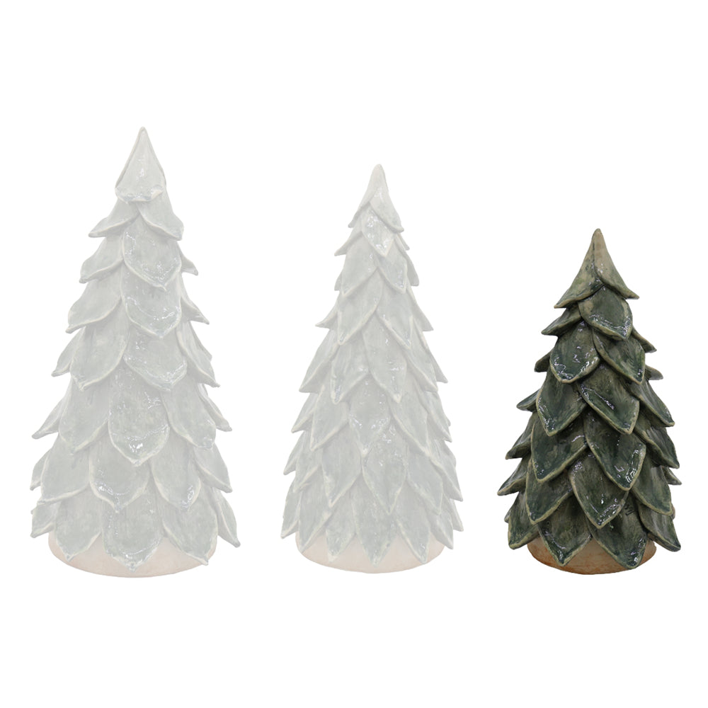 Three decorative Christmas tree ornaments in different sizes, featuring textured layered scales. Two are frosted white, and one is dark green with a rustic brown base.