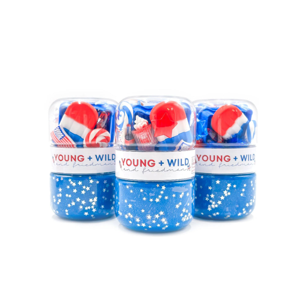 Three small jars with red, white, and blue items on a white background