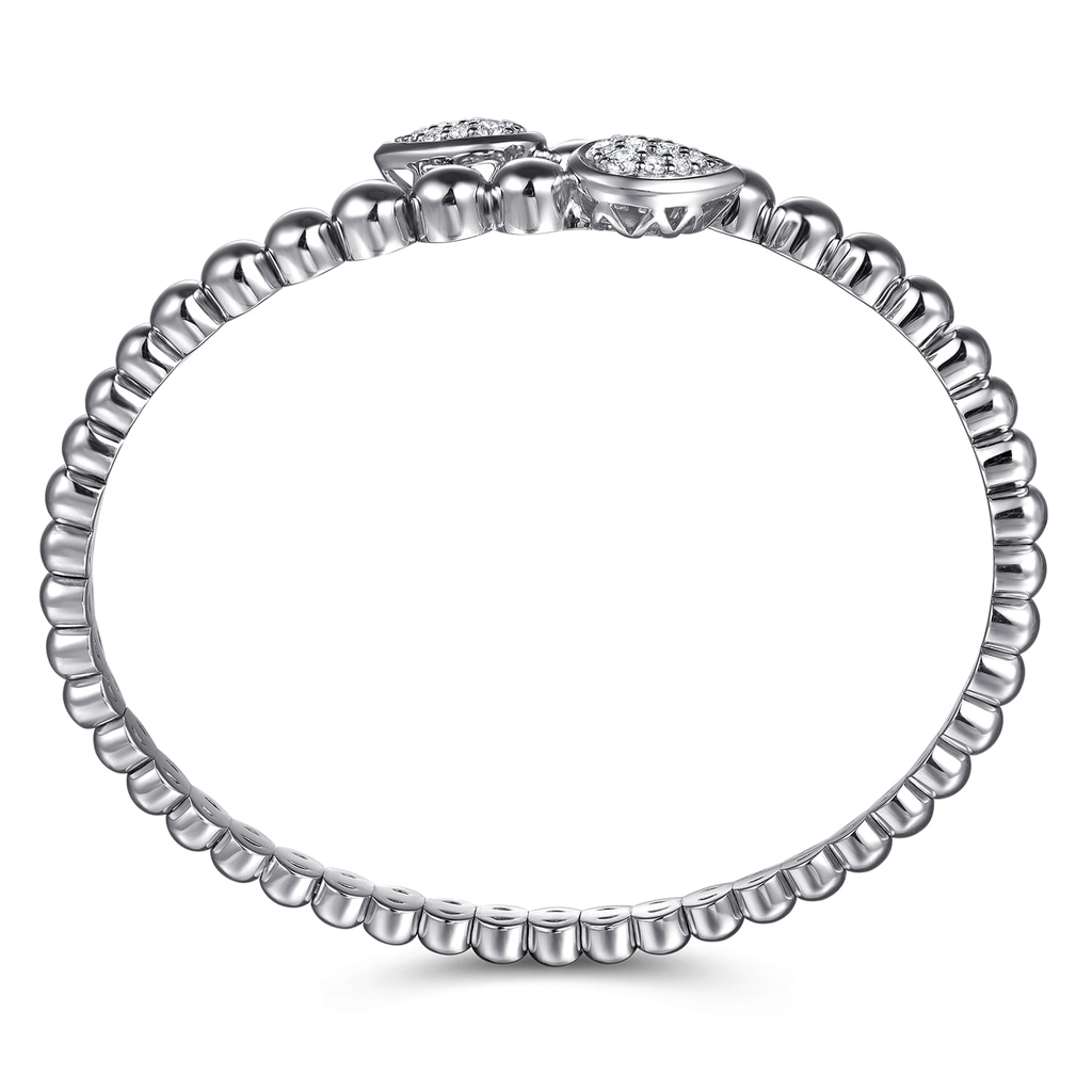 Silver bracelet with heart-shaped clasp on a white background