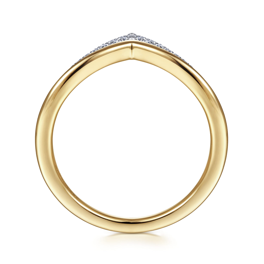 Gold ring with small diamonds on a white background