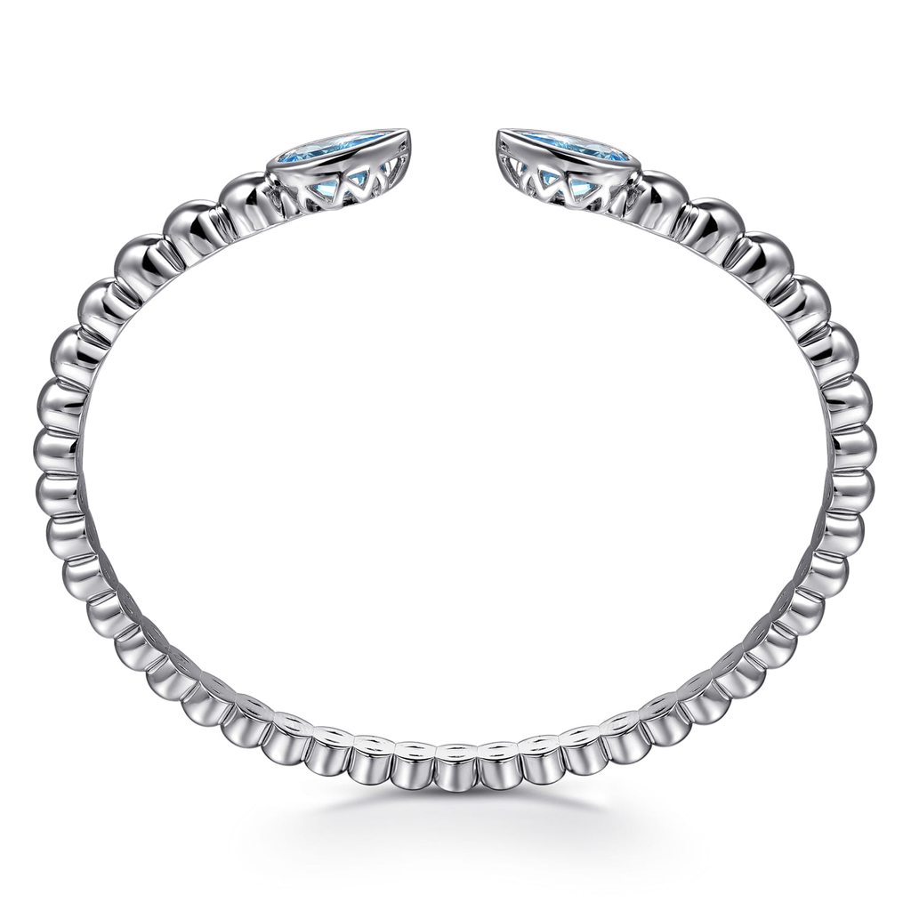 Silver ring with gemstones on a white background