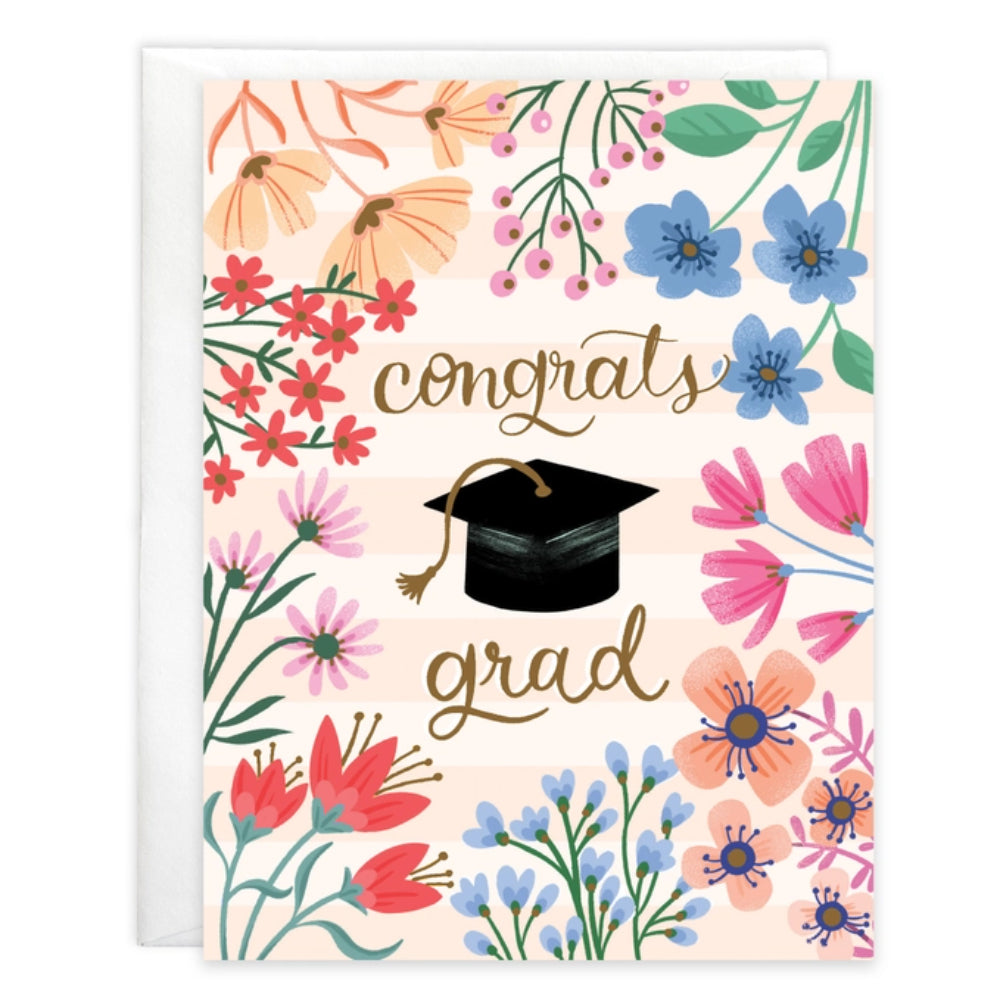 Graduation card with flowers and a cap on a floral background