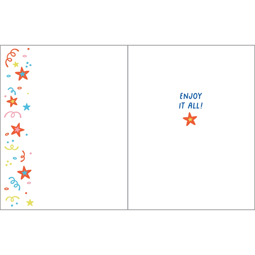 celebration design inside birthday greeting card with text "enjoy it all". 