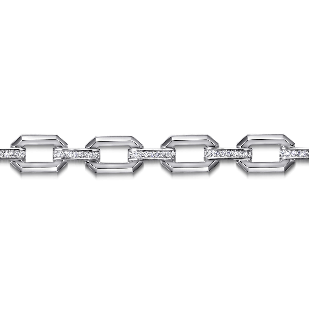 silver link bracelet with clear stones on white background