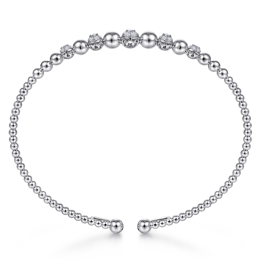 silver beaded bangle bracelet with clear stones on white background