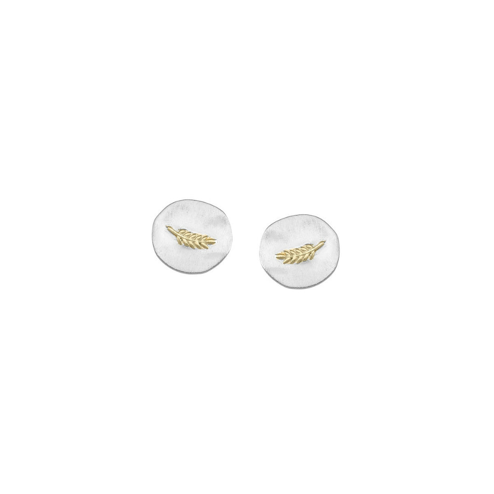 silver round disc stud earrings with yellow gold detail on a white background