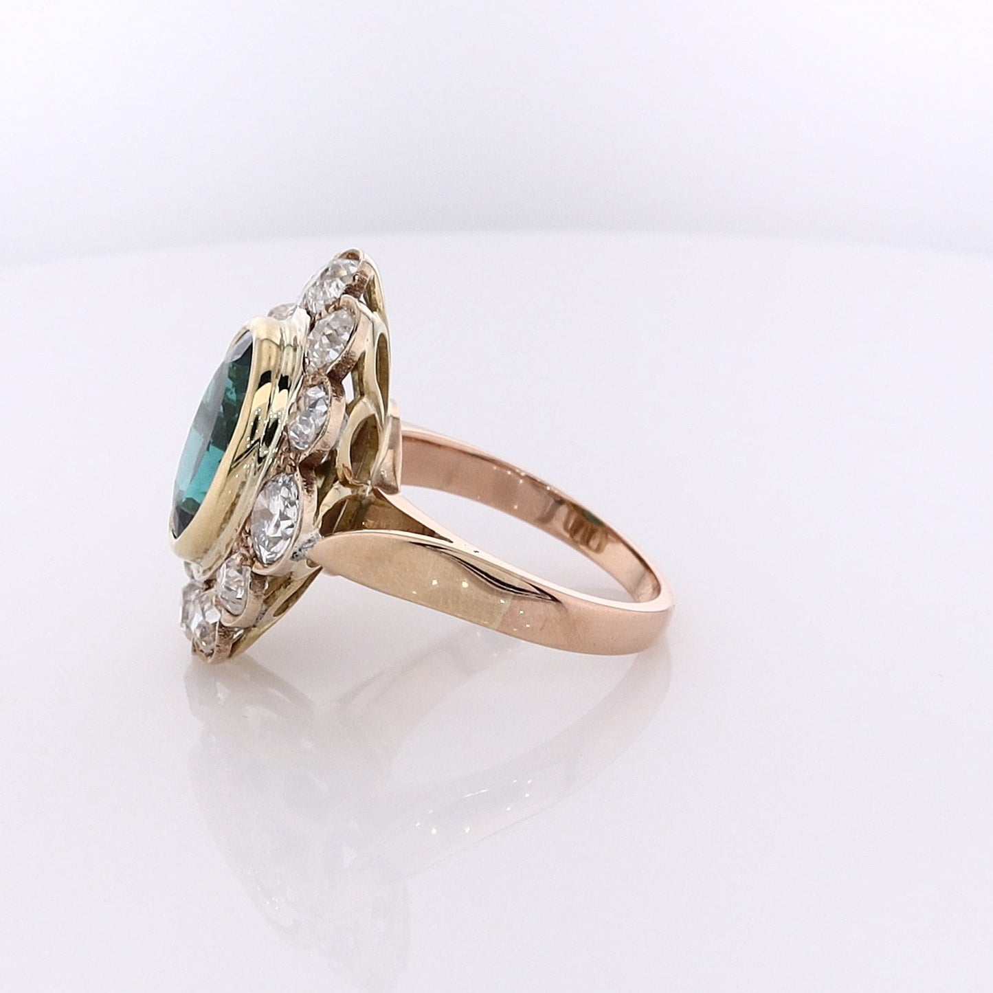 Estate 18 Karat Yellow Gold Oval Tourmaline and Diamond Halo Ring