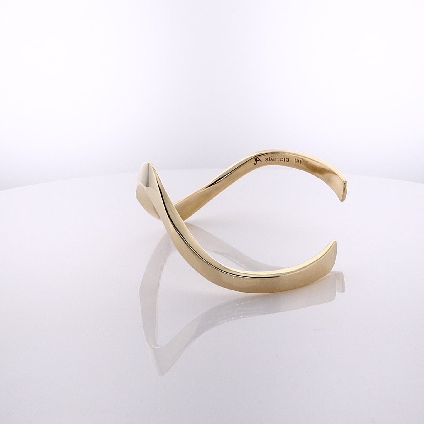 Estate Atencio 18 Karat Yellow Gold "Christy Twist" Wavy Design Polished Finish Diamond Cuff Bracelet