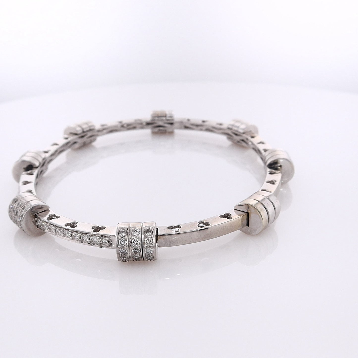 Estate 18 Karat White Gold Hinged Diamond Bangle Bracelet With Cutout Design
