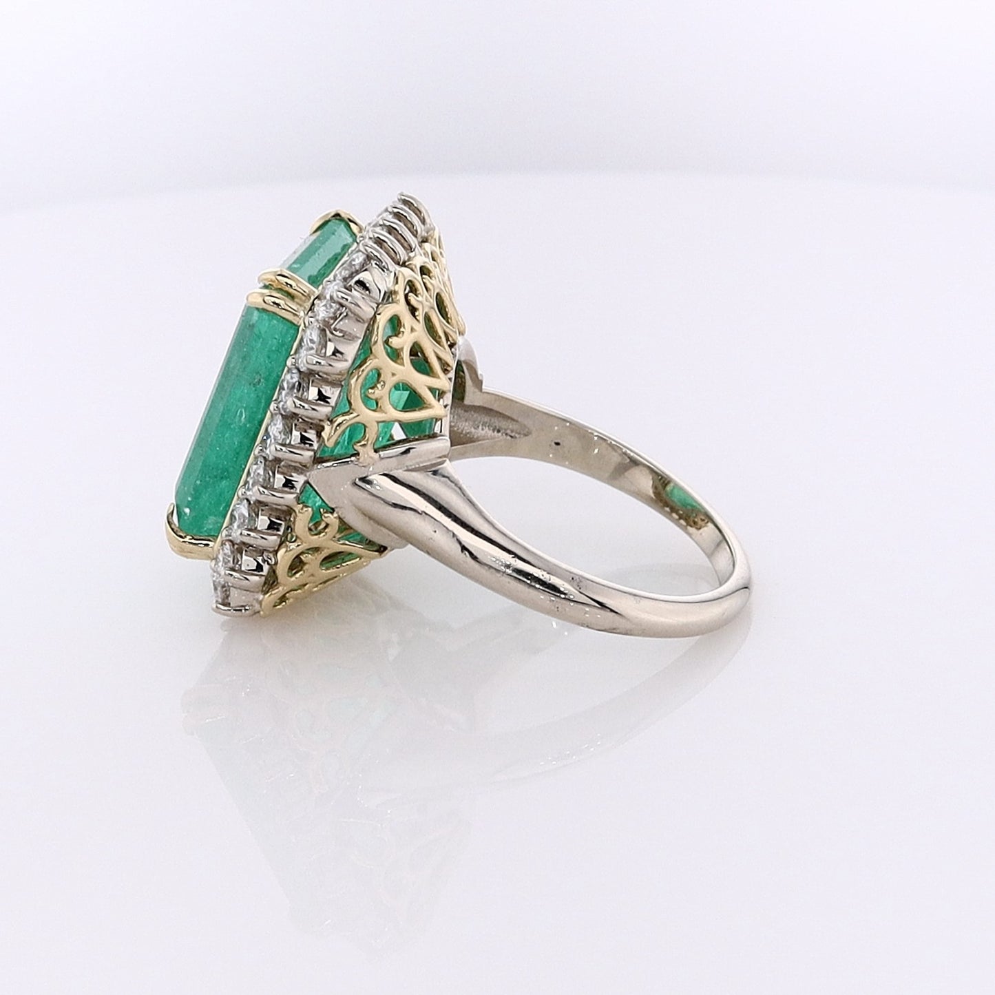 Estate 18 Karat White and Yellow Gold Emerald and Diamond Ring