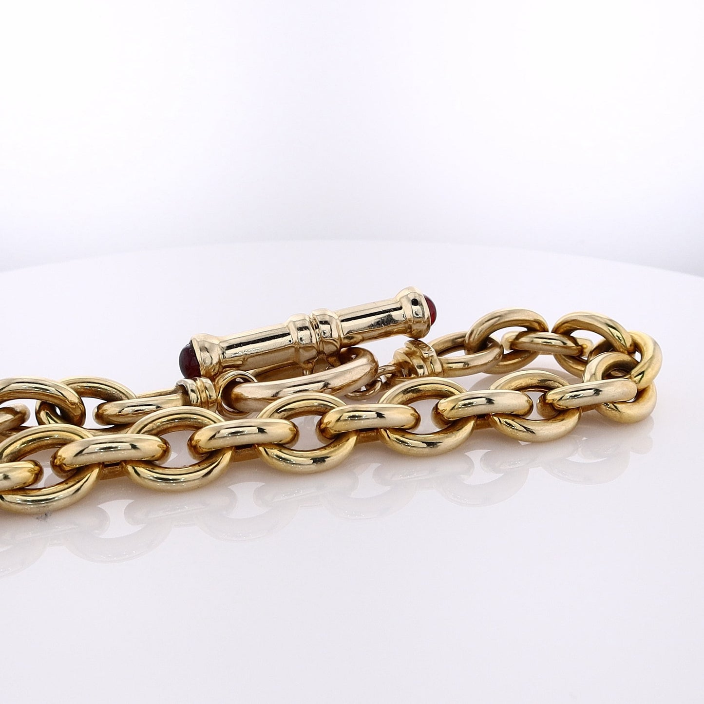 Estate 14 Karat Yellow Gold Polished Oval Link Garnet Bracelet