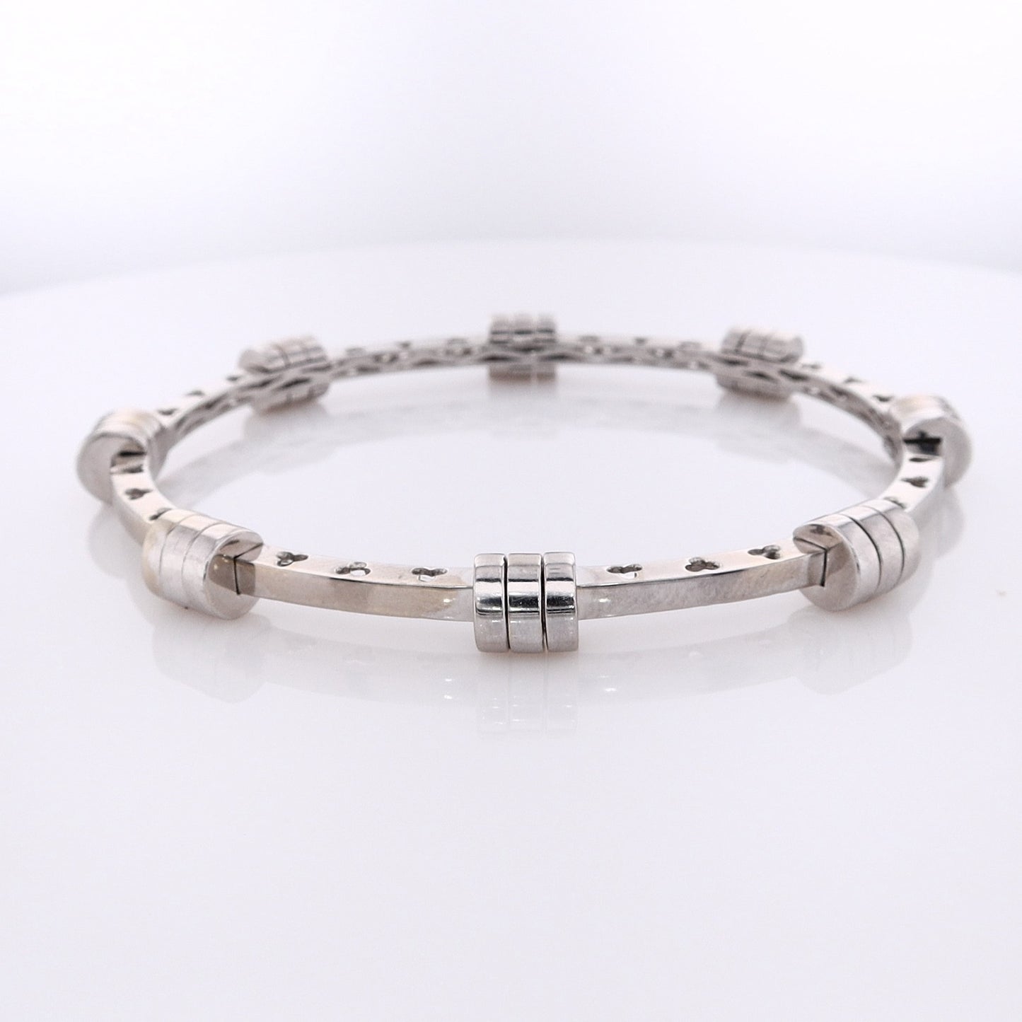 Estate 18 Karat White Gold Hinged Diamond Bangle Bracelet With Cutout Design