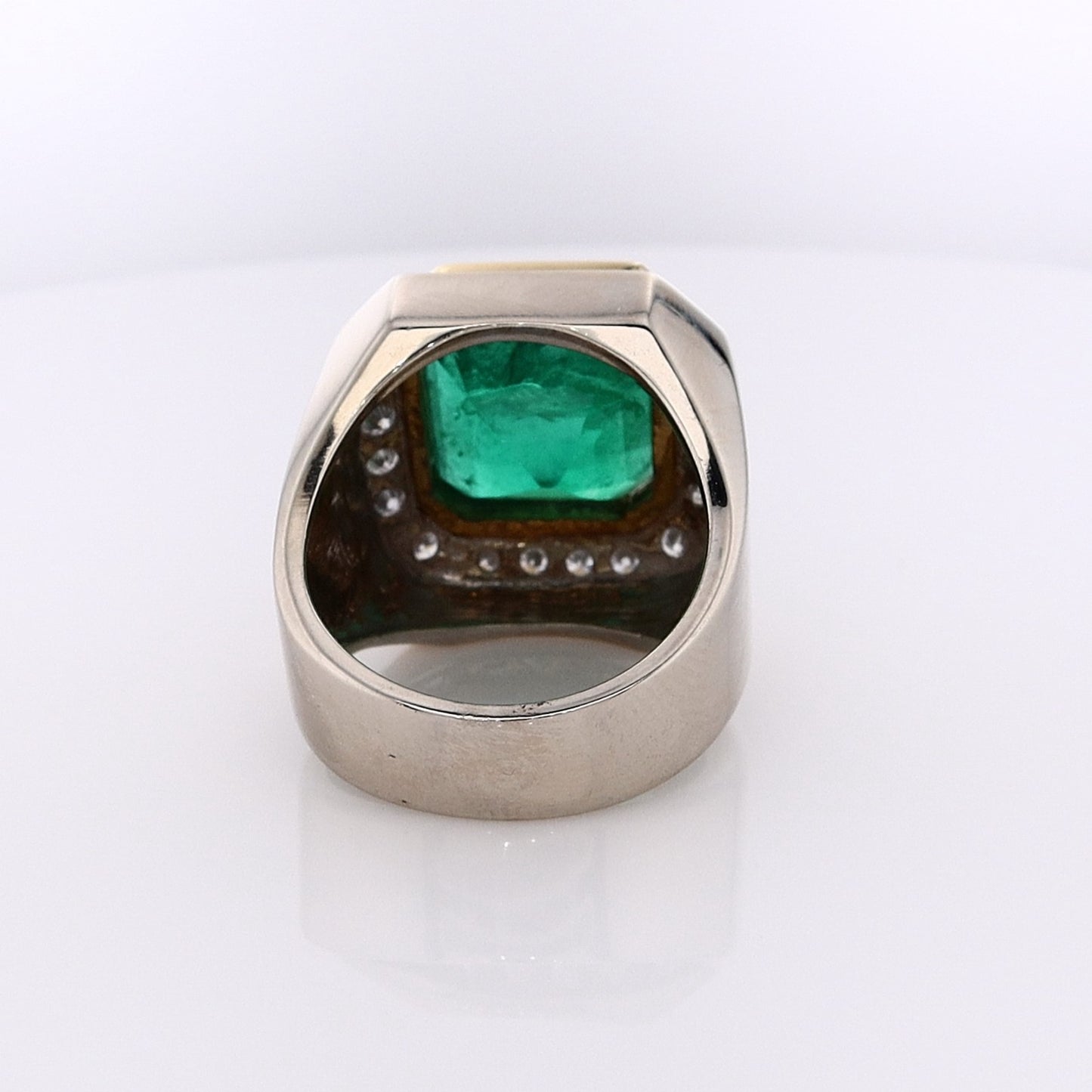 Estate 18 Karat Two-Tone Emerald Ring With Diamond Surround