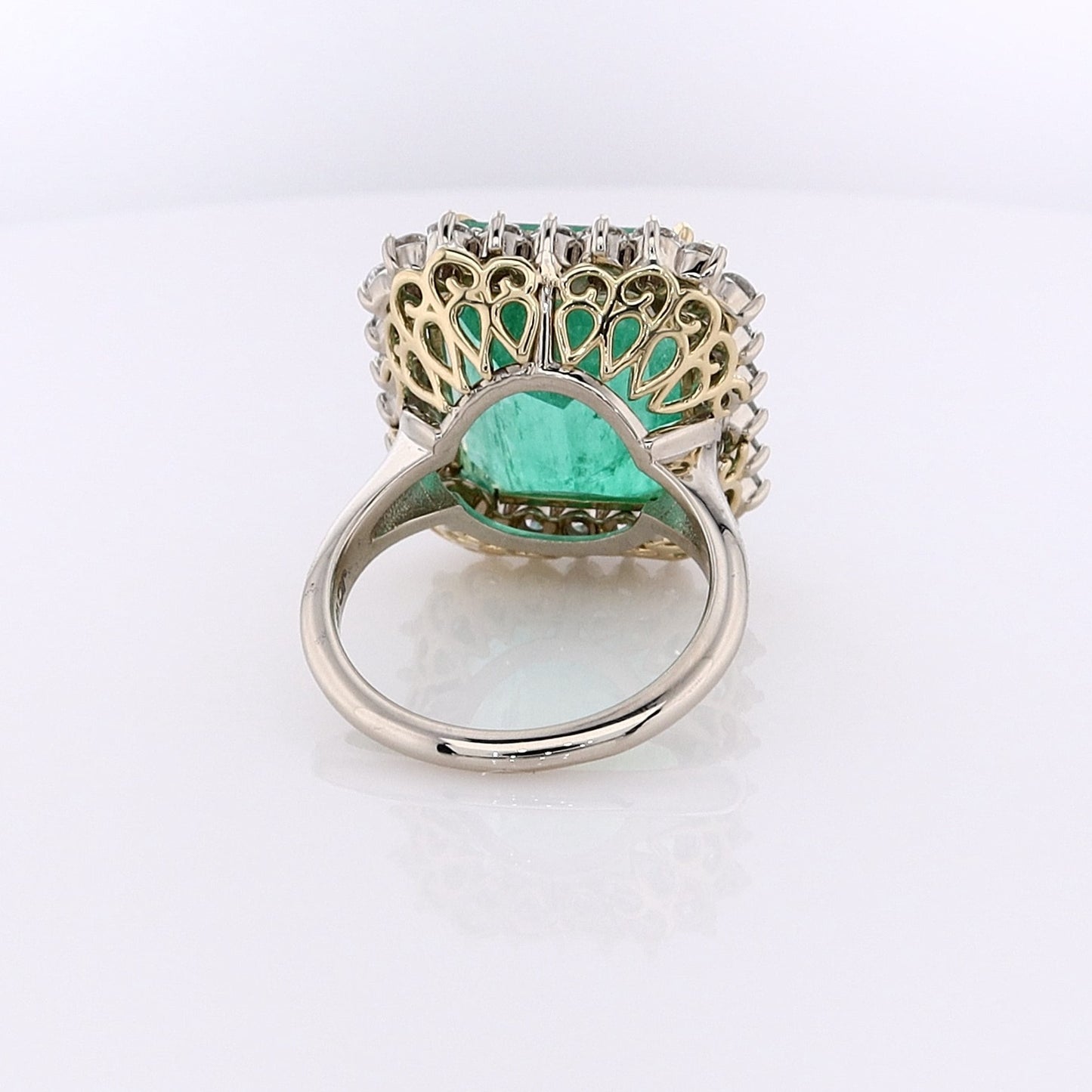 Estate 18 Karat White and Yellow Gold Emerald and Diamond Ring