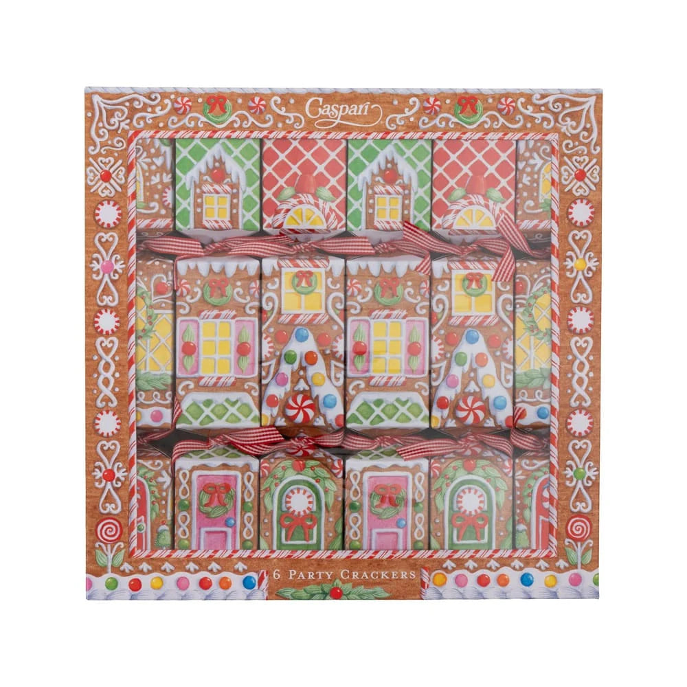 A square box of 6 party crackers from the brand Caspari, featuring a festive gingerbread house illustration with red striped ribbons and colorful candy decorations.