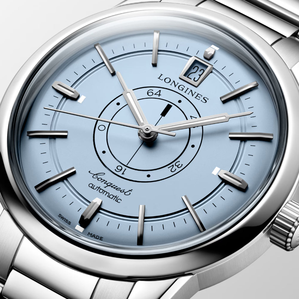 Longines watch with a light blue dial and silver case