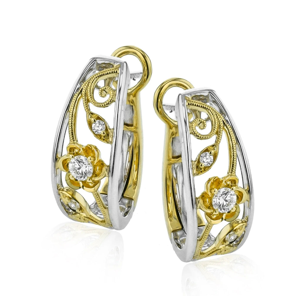 gold and silver trellis open work earrings on a white background