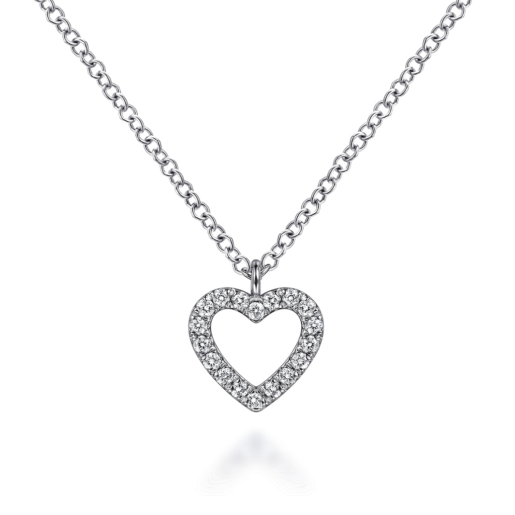 Heart-shaped diamond necklace on a white background