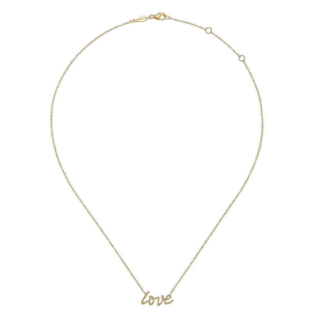 Gold necklace with 'love' pendant on a white background
