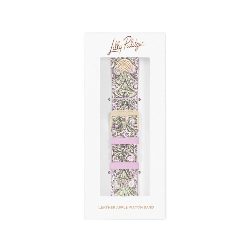 Lilly Padigan leather Apple Watch Band in a white presentation box, featuring a green and purple paisley pattern with light pink leather accents and a gold buckle.