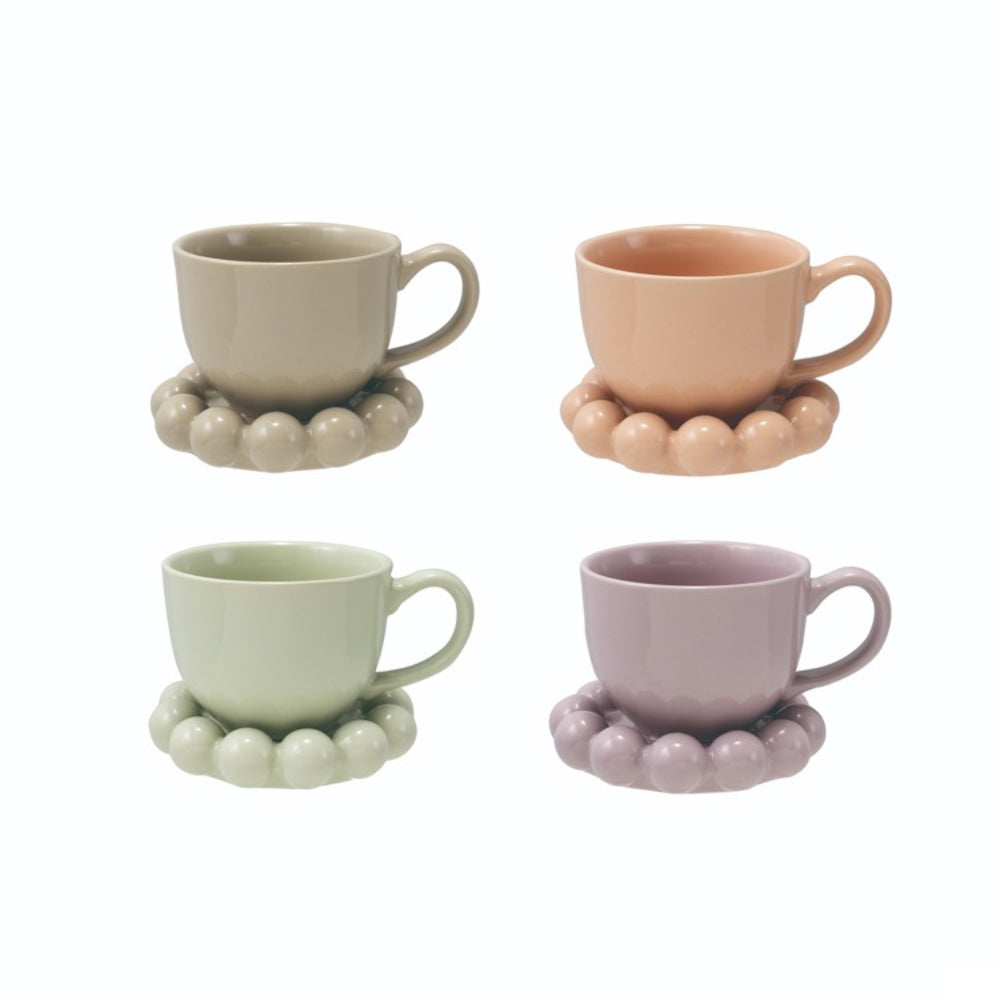Four ceramic cups in Lavender, Peach, Sage Green, and Taupe colors