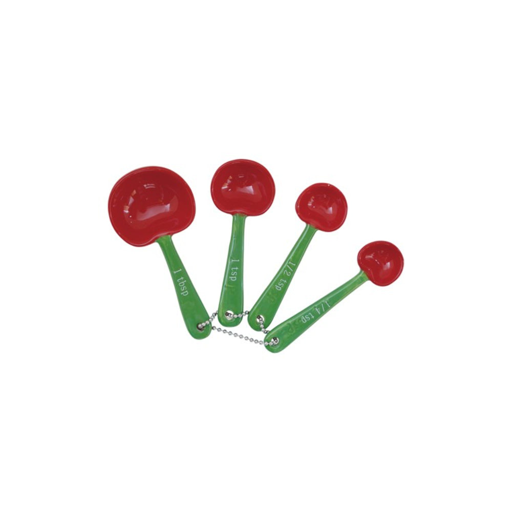 Set of four red cherry measuring spoons with green handles on a white background.