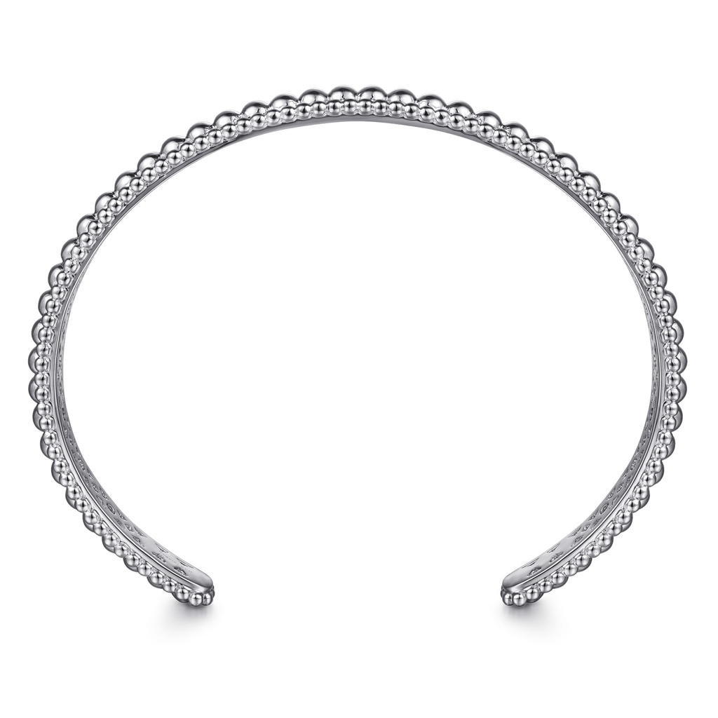 Silver headband with beaded design on a white background
