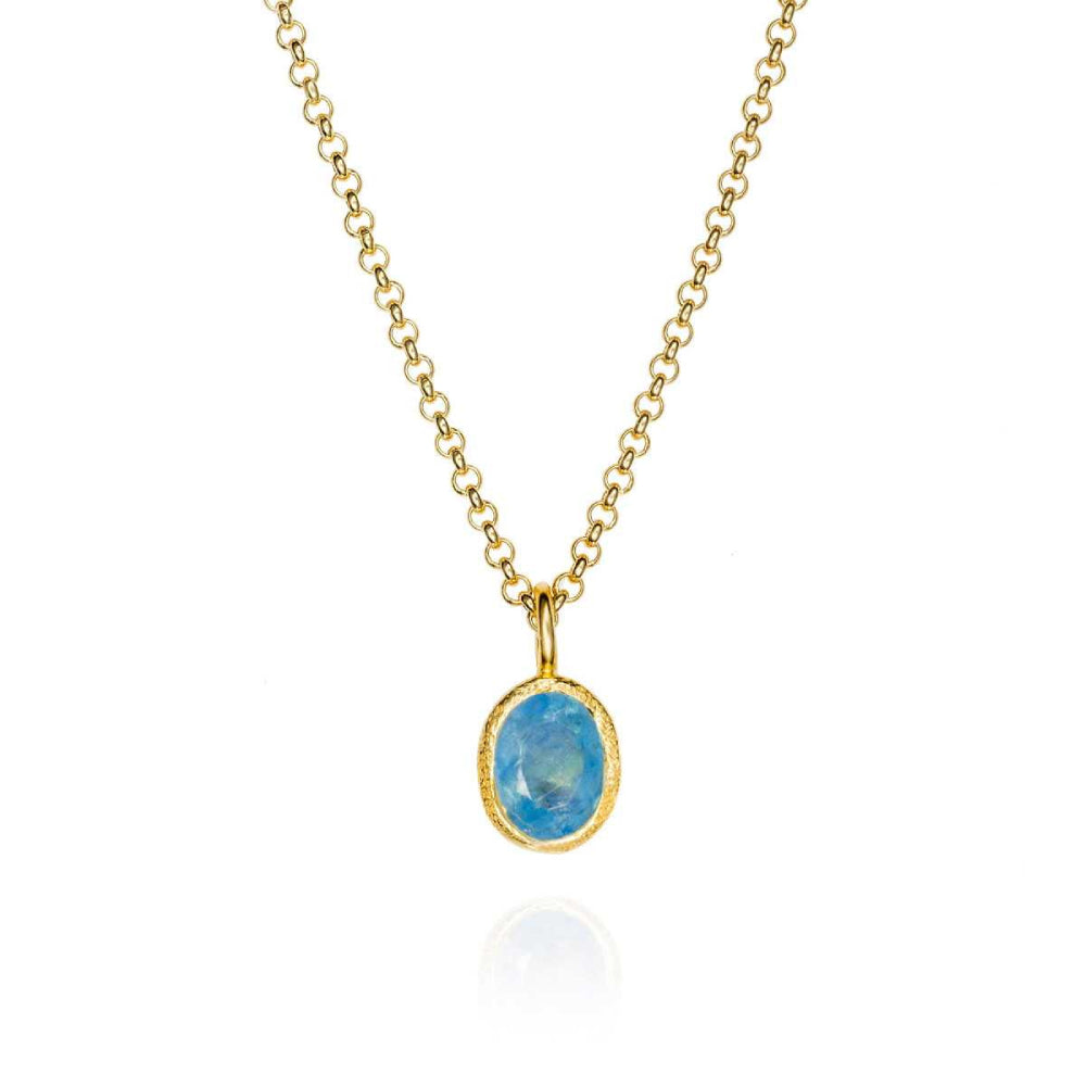 gold-tone necklace with blue center stone on a white background