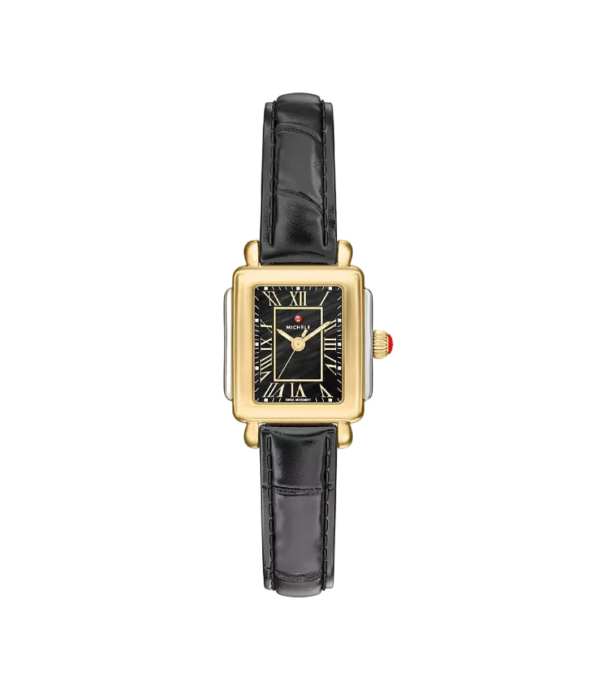 A rectangular gold-tone watch with a black dial, Roman numeral hour markers, and a black leather strap, shown against a plain light gray background.