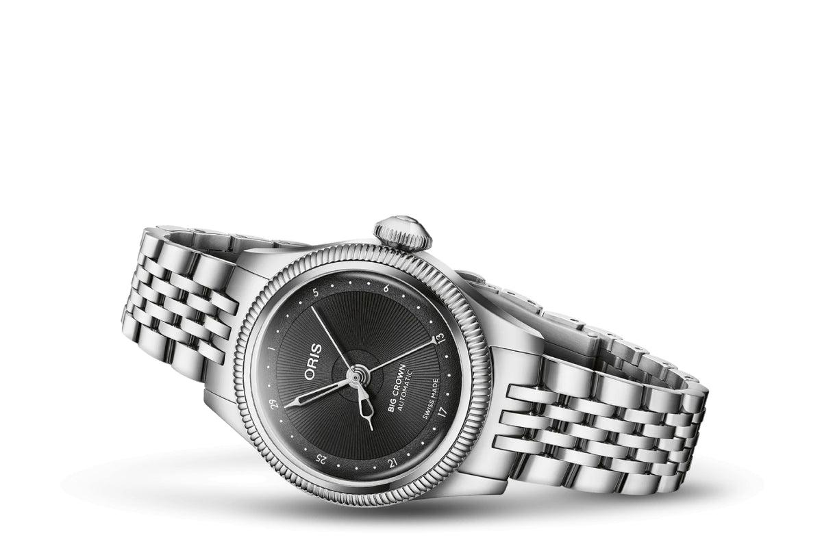An Ors Pulsometer watch with a silver stainless steel link bracelet, a silver bezel, and a black dial, shown on a clean white background.