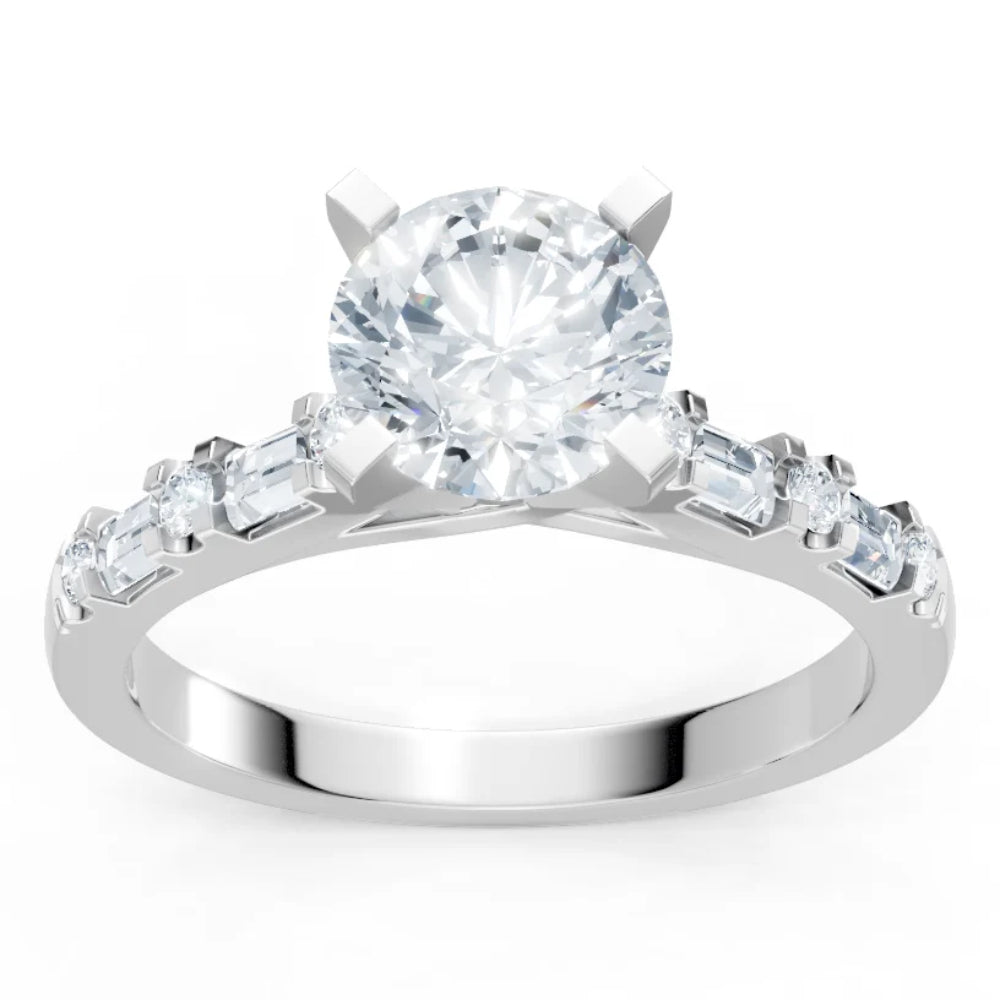 A white gold or platinum solitaire engagement ring featuring a round brilliant-cut center stone and baguette-cut side stones, shown on a clean white background.