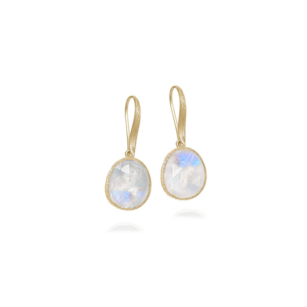 gold-tone hook earrings with white stones on a white background