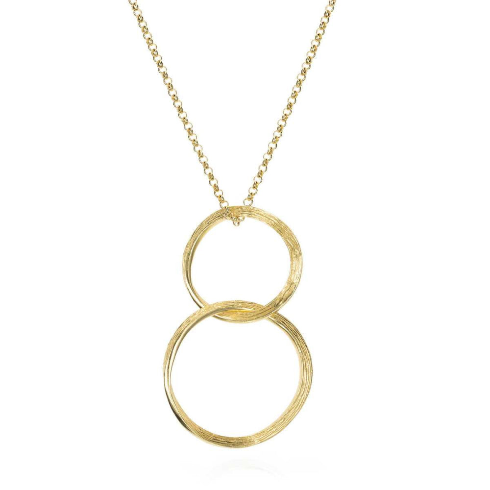 gold necklace with 2 gold rings on a white background