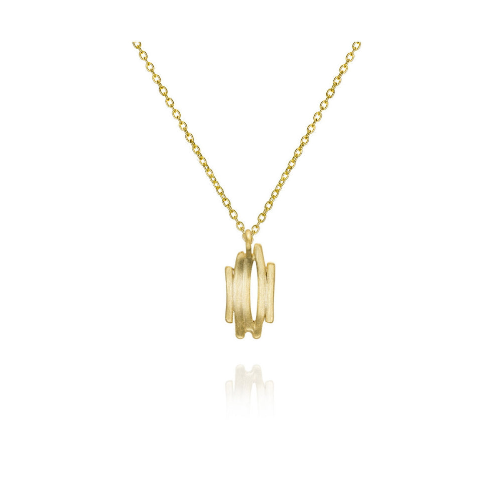 A gold pendant necklace featuring three vertically stacked, polished cylindrical rings on a delicate gold chain, shown against a plain white background with a soft reflection below.